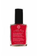 Red nail polish bottle with black cap on a white background