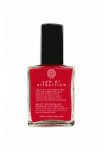 Red nail polish bottle with black cap on a white background