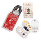Collection of playing cards with various designs and a box labeled 'Citadel'.