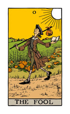 Tarot card featuring 'The Fool' with a person in a field of pumpkins.
