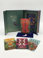 Set of tarot cards with a decorative box on a white background