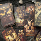 Collection of tarot cards with intricate designs on a dark textured surface.