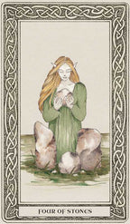 Card from a tarot deck featuring a fairy holding stones with decorative border and text.