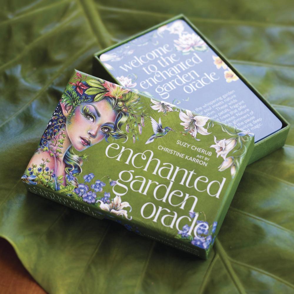 Enchanted Garden Oracle card set on a green leafy background