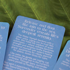 Blue card with text on a green leaf background