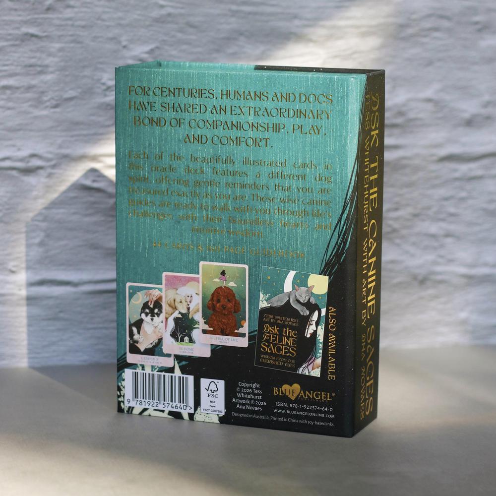 Book titled 'Ask the Canine Sages' with text and images on a textured surface