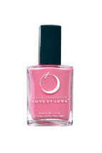 Pink nail polish bottle with black cap on a white background