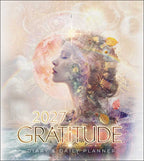 A 2027 Gratitude Diary & Daily Planner cover featuring a double-exposure portrait of a woman's profile with a glowing moon, stars, leaves, and small decorative elements. Large gold text reads '2027 GRATITUDE' with 'DIARY & DAILY PLANNER' below on a soft pastel background.
