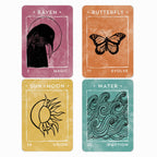 Four tarot cards with illustrations of a raven, butterfly, sun, and moon on a white background.