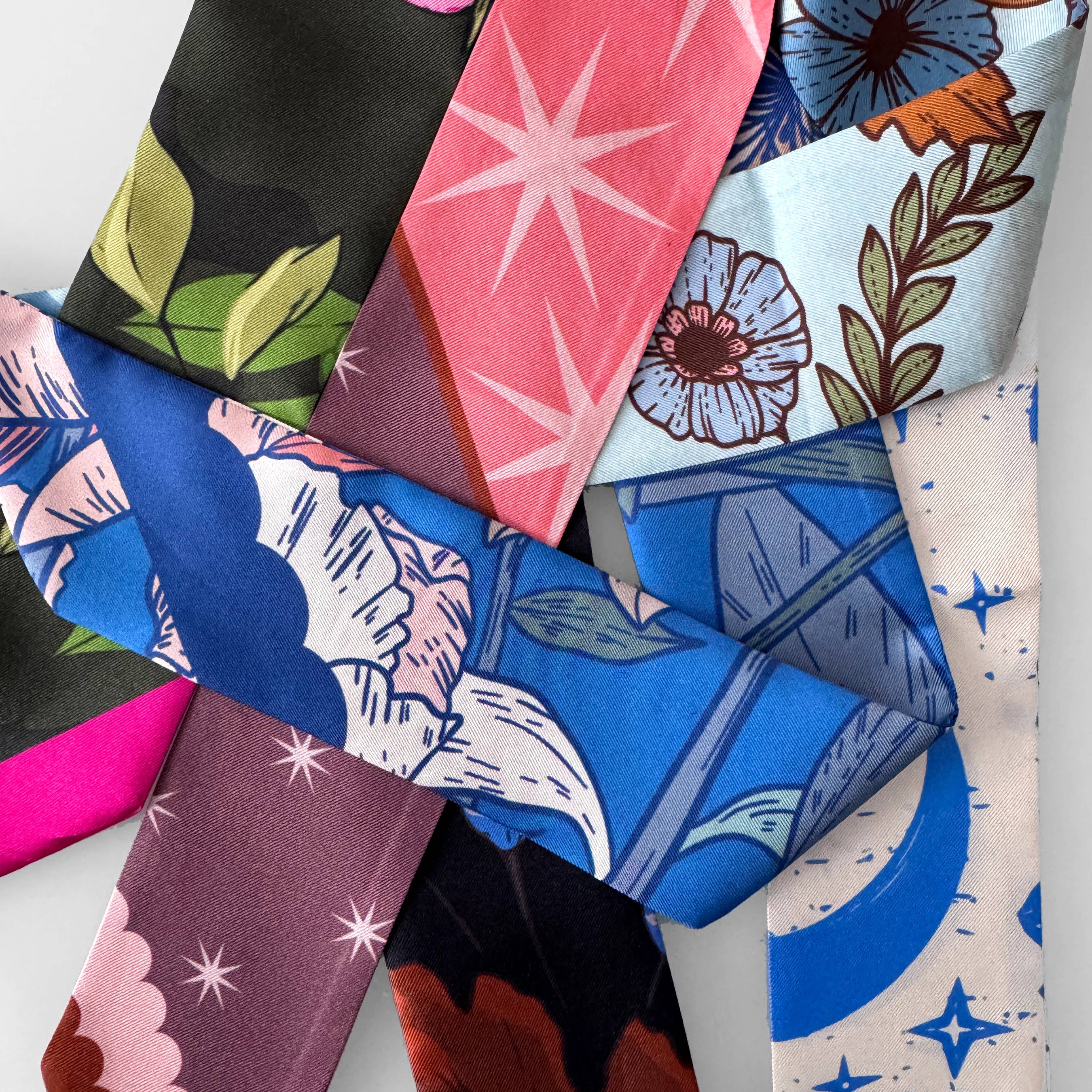 Collection of colorful fabric swatches with various patterns.