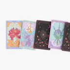 Set of tarot cards with colorful designs on a white background