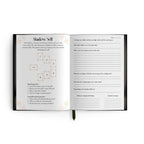 Open book with questionnaire on a white background