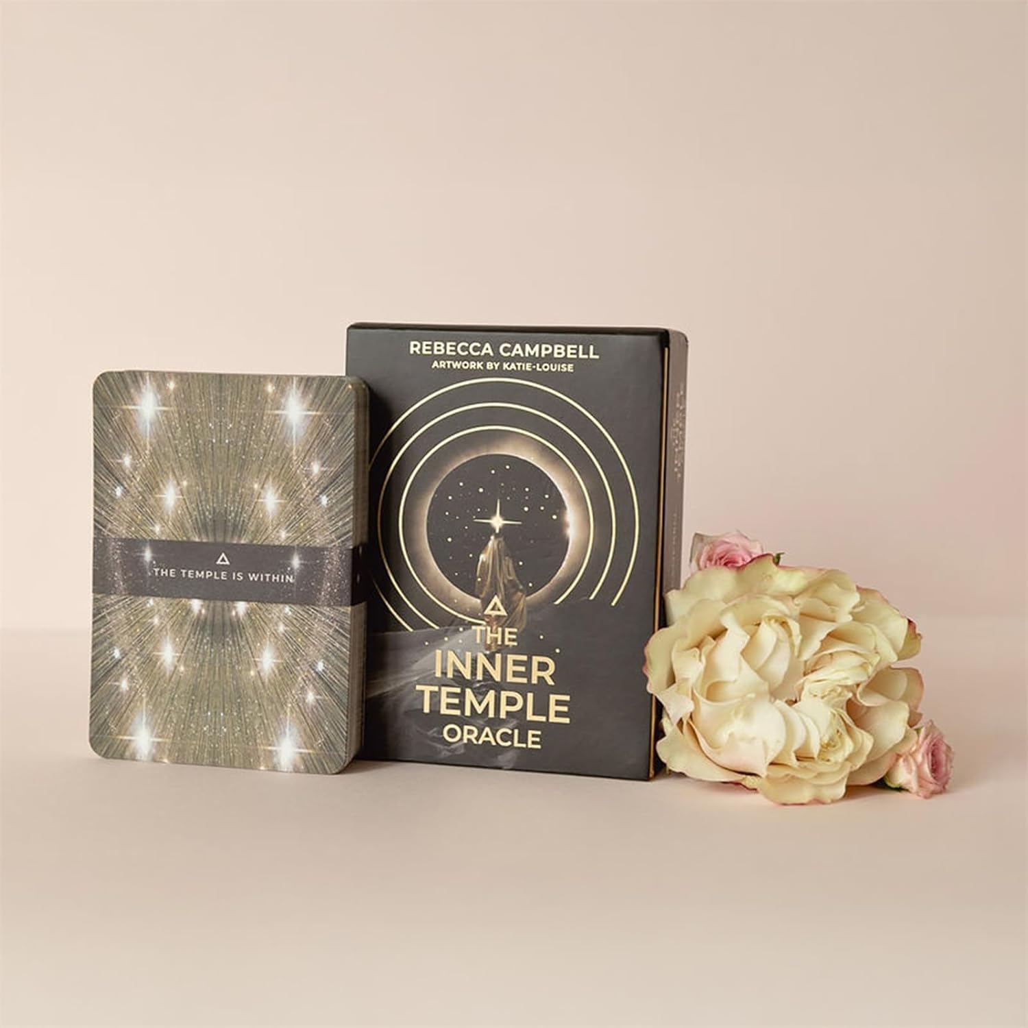 The Inner Temple Oracle book by Rebecca Campbell with a decorative cover and flowers on a beige background