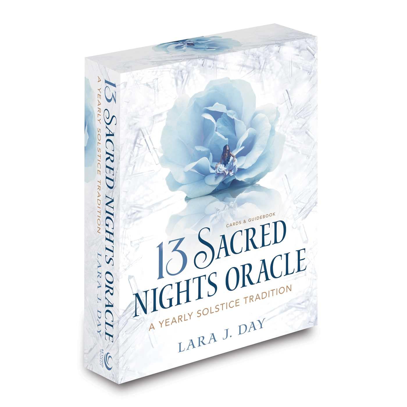 The boxed set of the 13 Sacred Nights Oracle card deck by Lara J. Day, featuring a white marble-textured cover with a large light blue flower and blue title text.