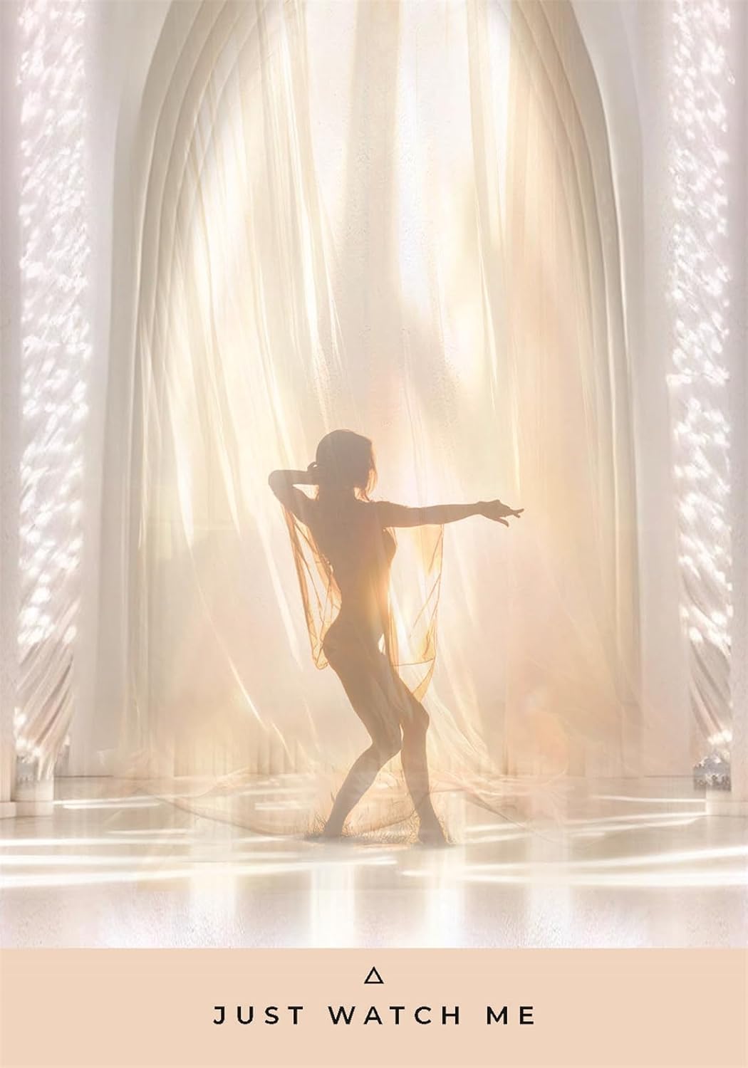 Silhouette of a dancer in front of a draped curtain with 'Just Watch Me' text at the bottom.