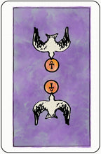 Tarot card with two bird-like figures on a purple background