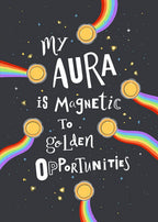 Motivational poster with text 'My Aura is Magnetic to Golden Opportunities' surrounded by rainbows and coins on a dark background.