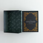 Book titled 'The Outlander Oracle' with decorative cover on a white background