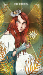 Tarot card featuring a woman with red hair and a flower, titled 'The Empress'.