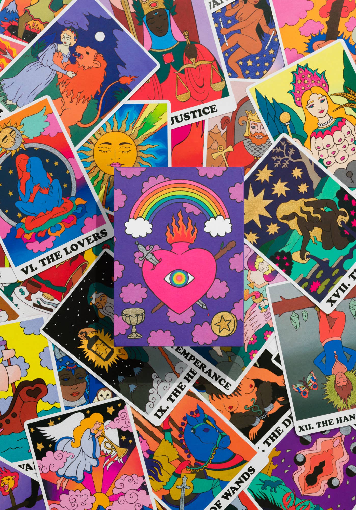 Collection of colorful tarot cards with various symbols and designs.