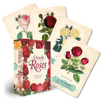 Oracle cards featuring illustrations of roses with a deck cover titled 'Oracle of the Roses'.