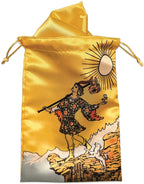 Gold satin drawstring pouch with tarot card design featuring a figure and sun on a white background