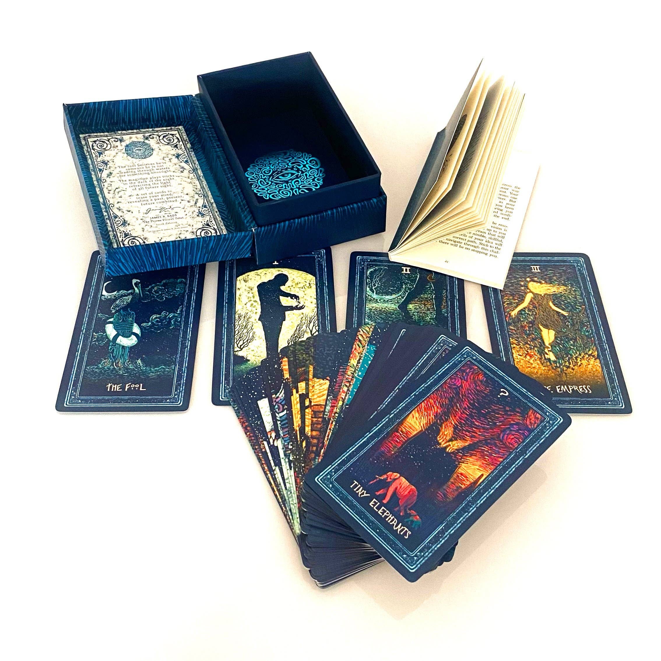 Collection of tarot cards with artistic designs on a white background