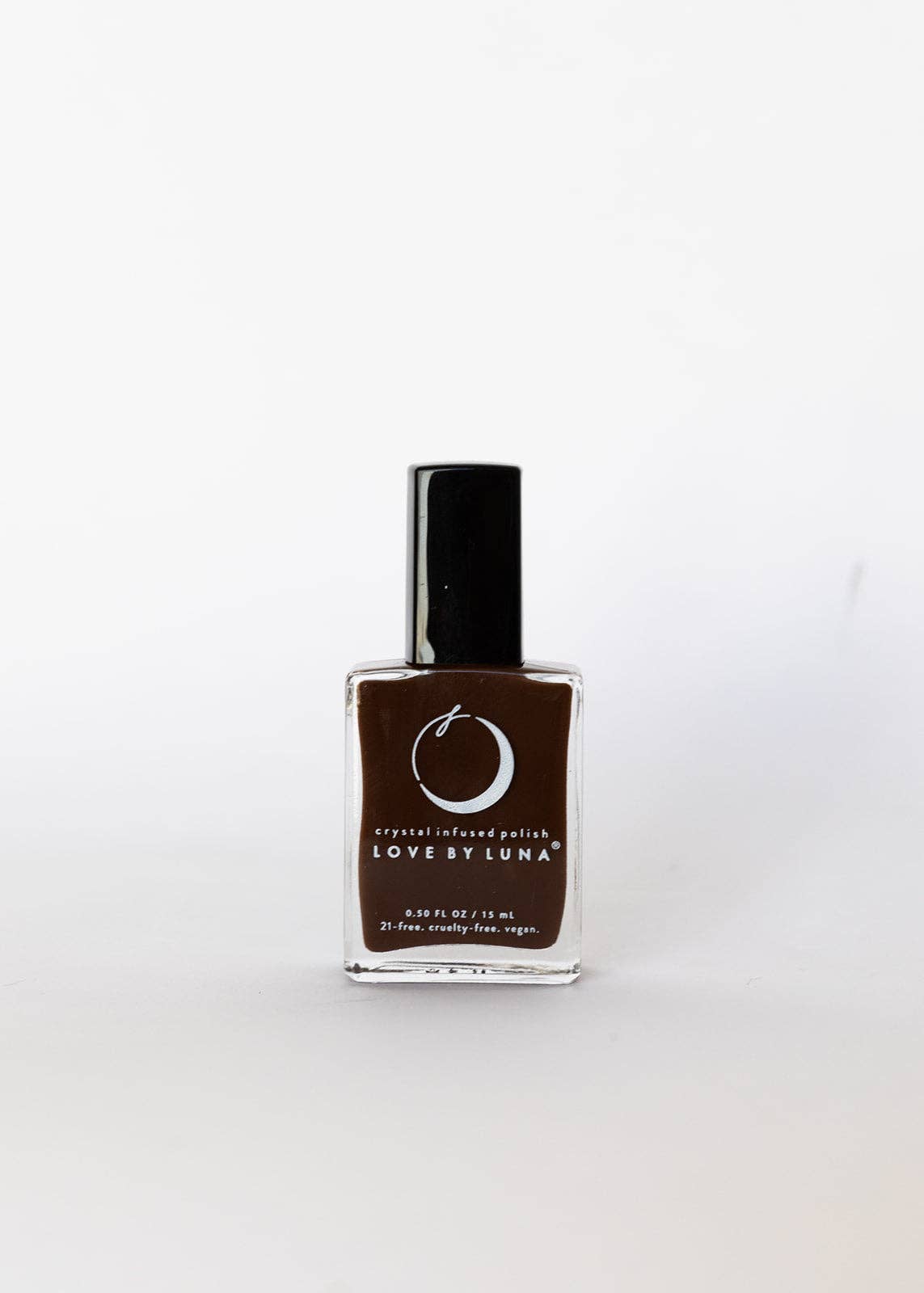 A bottle of Loxet Luna crystal-infused nail polish in the shade Lovestrong, featuring a dark brown polish inside a clear glass bottle with a black cap, set against a plain white background.