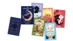 Set of colorful tarot cards with various designs on a white background