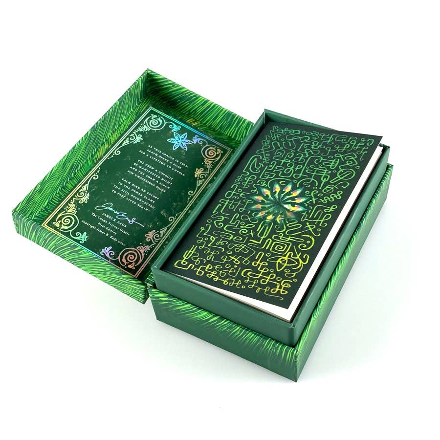 Green decorative box with intricate patterns on a white background