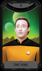 A stylized portrait card featuring a man in a Star Trek-style gold and black uniform against a green space background with planets. The card has a dark border and the text 'THE FOOL' at the bottom.