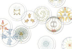 Set of tarot cards with various symbols and designs on a white background