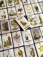 Collection of illustrated cards with various designs on a dark background