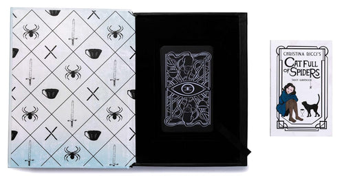 Collection of books with black and white designs on a white background