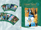 Gaian Tarot cards with a book cover featuring a woman sitting under a tree.