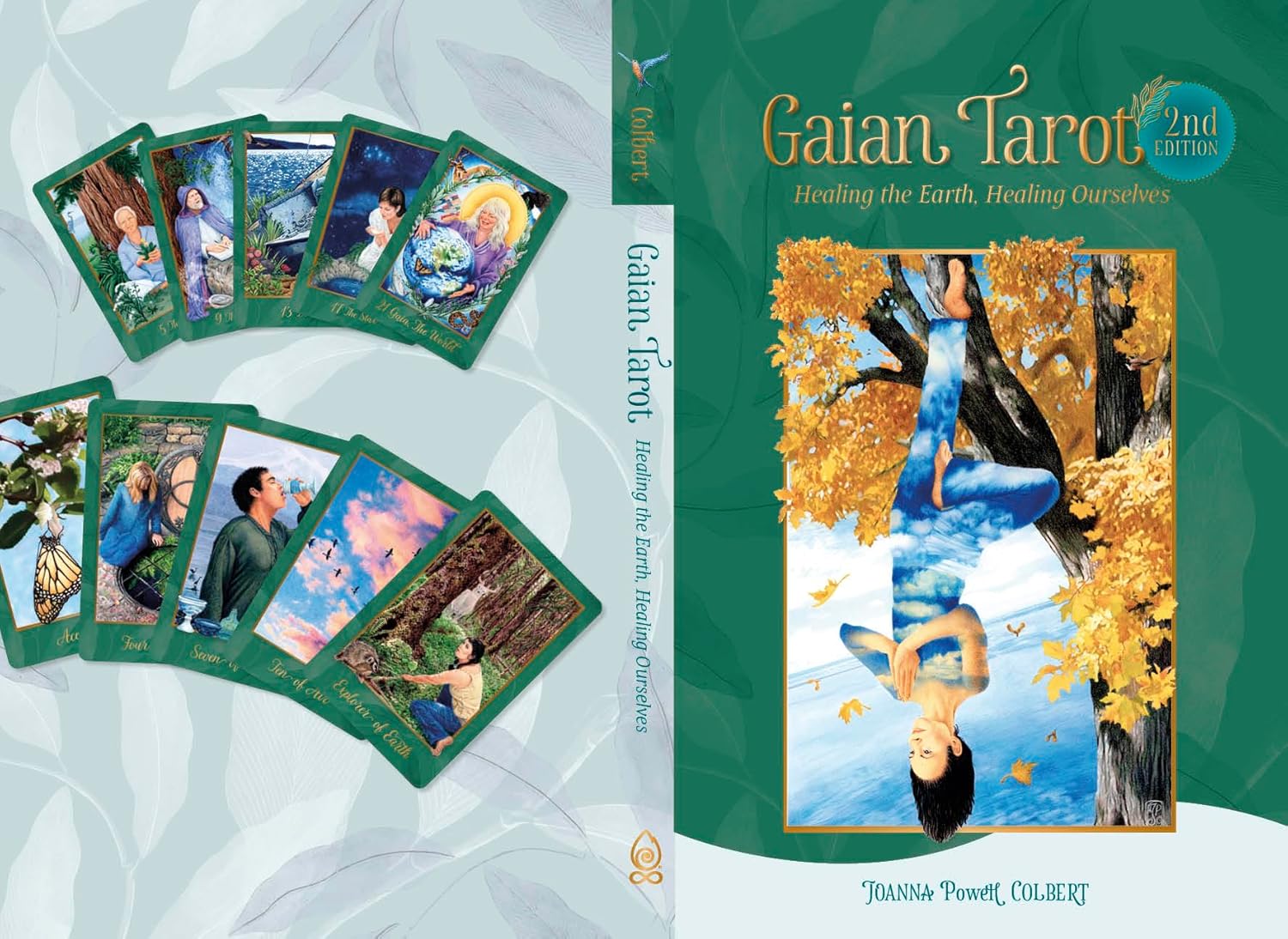 Gaian Tarot cards with a book cover featuring a woman sitting under a tree.