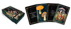 Set of mushroom-themed playing cards with a box on a white background
