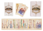 World of Warcraft trading cards with card sleeves and a dragon illustration.