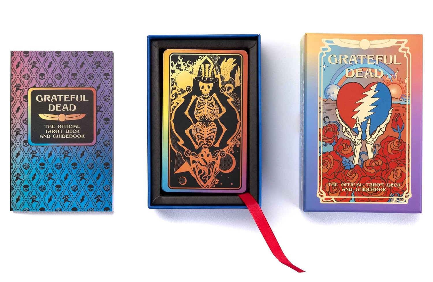 Grateful Dead official tarot deck and oracle book set shown on a white background, including a patterned box, an open deck box with a skeleton card, and the oracle book with a red ribbon.
