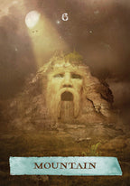 Stylized mountain with face-like features under a moonlit sky, labeled 'Mountain'.