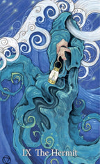 Tarot card featuring 'The Hermit' with a person in blue robes holding a lantern against a swirling blue and white background.