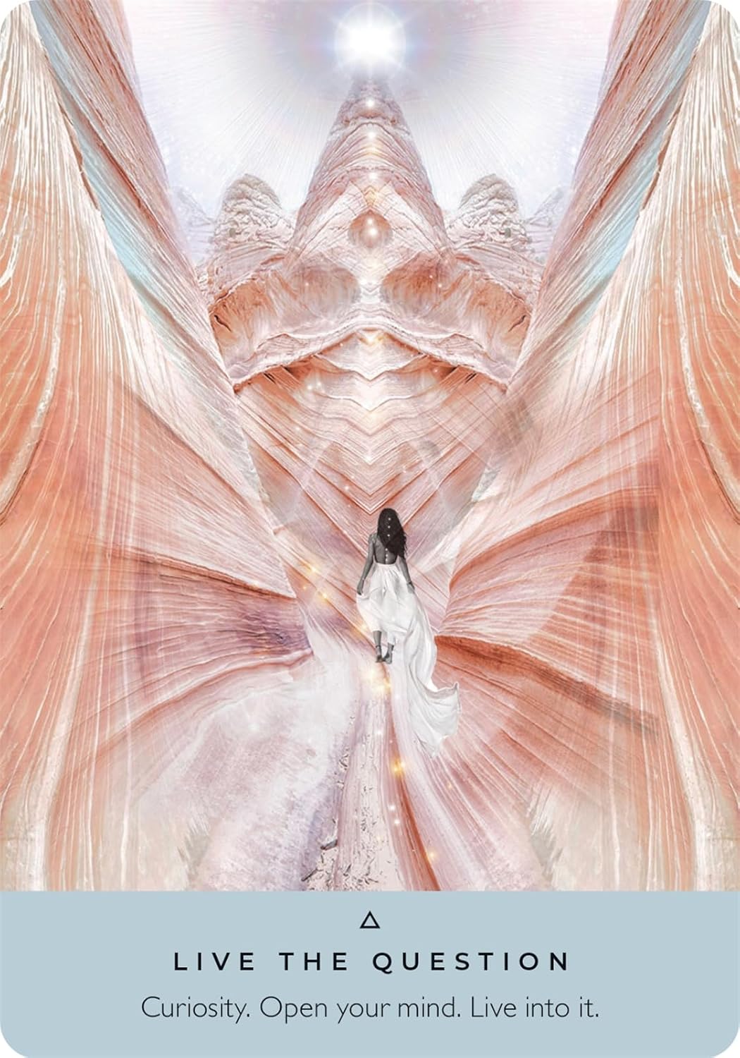 Person in a white dress standing in front of a large crown with draped fabric, quote 'Live the Question' at the bottom.