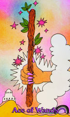 Card with a hand holding a wooden wand against a colorful background with stars and a mountain.