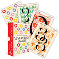 Numerology Oracle cards with colorful designs and text on a white background