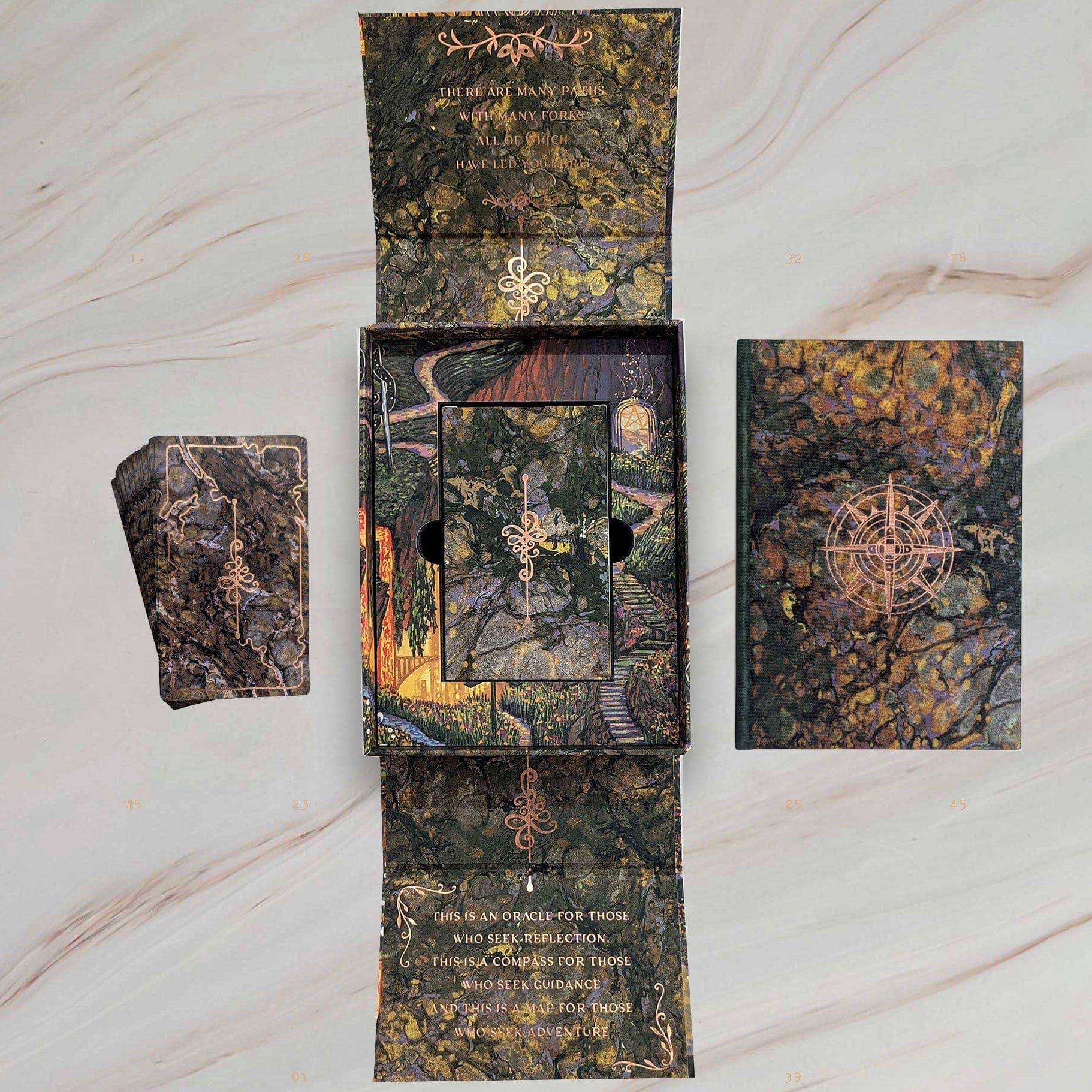 Decorative box set with marble-like design on a marble surface