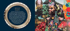 Decorative plate with text and a colorful portrait of a person with intricate makeup and headpiece.