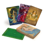 Set of tarot cards with colorful artwork on a white background