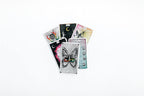 Collection of tarot cards with various designs on a white background