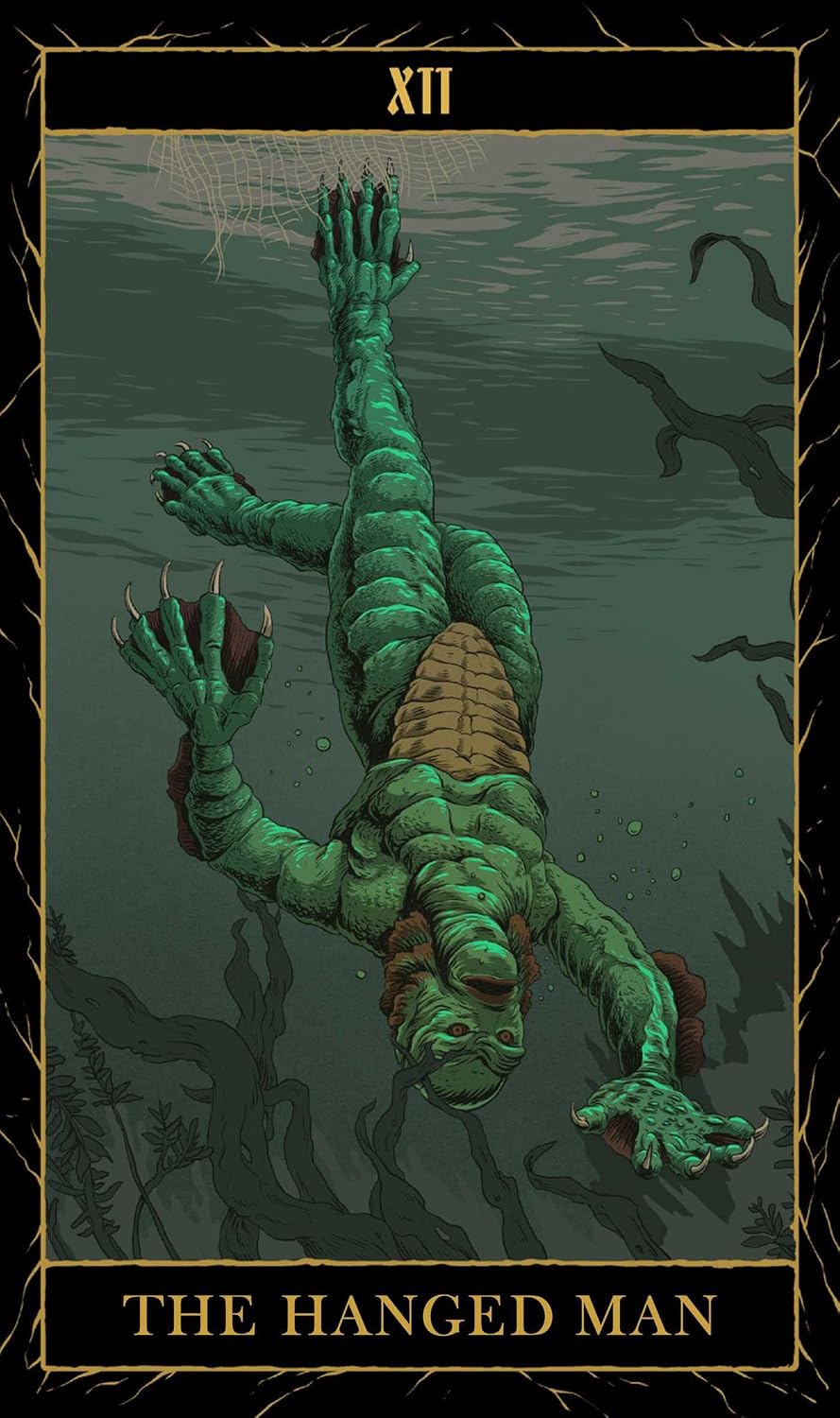 Tarot card featuring a green figure hanging by its feet with water and fish in the background.