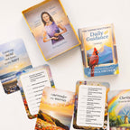 Set of tarot cards with a box labeled 'The Tapping Solutions Daily Guidance' by Jessica Ortner on a white background.